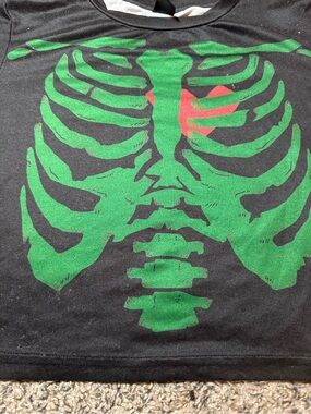SHEIN Black crop top with Green Ribcage Graphic and Red Heart Accent